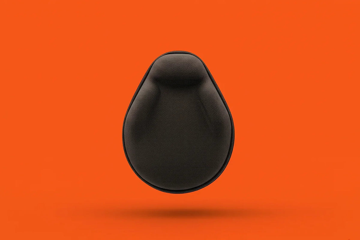 Black protective headphone case with textured surface on bright orange background