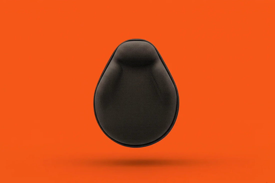 Black protective headphone case with textured surface on bright orange background