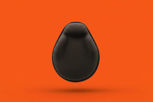 Black protective headphone case with textured surface on bright orange background