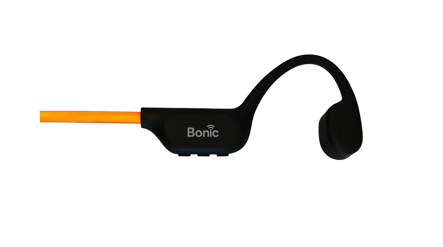 Bonic wireless black bone conduction headphones with orange cable on white background