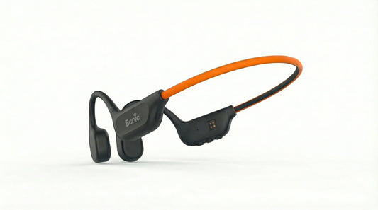 Bone conduction headphones with black earpieces and an orange band on white background